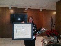 Anna Saliba displaying her CCP certificate