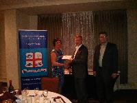 Barbara Baron presenting award for highest mark in Financial Accounting Fundamentals to Ian Berard, sponsor Altagas Ken Spurr on right