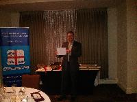 Ken Spurr accepting Chapter awards for Highest mark in business communic