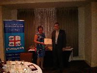 Ken Spurr and Barbara Baron presenting award for highest mark in Credit management, sponsered by Altagas