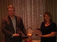 Ken Spurr and Dana Swekla with National awards for Joanne Jenna Foth who was absent